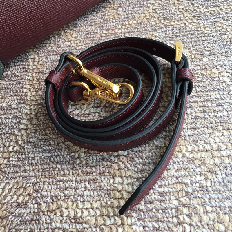 Pra*a top handle bags